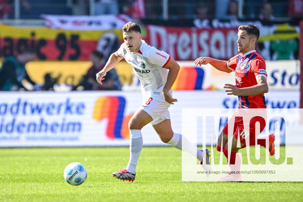 Maximilian Eggestein SC Freiburg and Marvin Pieringer 1 FC Heidenheim in a duel during the Bundesliga match between 1 FC Heidenheim 1846 and SC Freiburg, Voith Arena on September 21, 2024 in Heidenheim, Germany Photo by Harry Langer DeFodi Images Maximilian Eggestein SC Freiburg and Marvin Pieringer 1 FC Heidenheim battle for the ball during the Bundesliga match between 1 FC Heidenheim 1846 and SC Freiburg at Voith Arena on September 21, 2024 in Heidenheim, Germany Photo by Harry Langer DeFodi Images DFL regulations prohibit any use of photographs as image sequences and or quasi video Defodi 541 FCHSCF20240920 148 Defodi-541 DFL regulations prohibit any use of photographs as image sequences and or quasi-video.