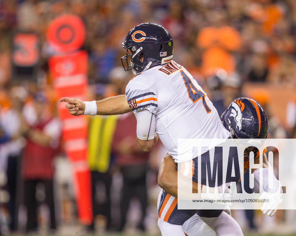 NFL, American Football Herren, USA 2018: Bears vs Broncos Aug 18 August 18, 2018: Chicago Bears quarterback Chase Daniel (4) getting the ball off before being tackled during the third quarter of an NFL preseason matchup between the Chicago Bears and the Denver Broncos at Broncos Stadium at Mile High Denver CO, Scott D Stivason Cal Media Denver Colorado United States of America