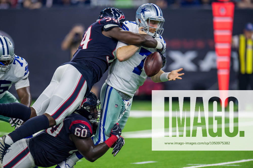 NFL, American Football Herren, USA 2018: Cowboys vs Texans AUG 30 August 30, 2018: Houston Texans linebacker Ufomba Kamalu (94) and Houston Texans defensive tackle Kingsley Opara (60) strip-sack Dallas Cowboys quarterback Cooper Rush (7), but the play was called back for a penalty, during the 2nd quarter of a preseason NFL football game between the Houston Texans and the Dallas Cowboys at NRG Stadium in Houston, TX. ..Trask Smith CSM Houston TX U.S.