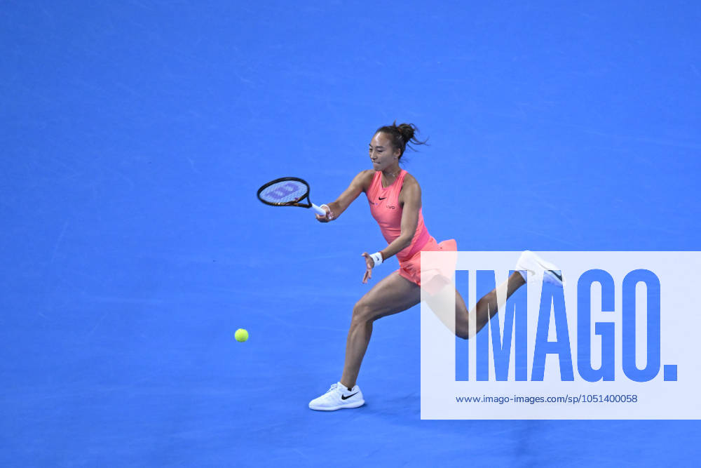 (241003) -- BEIJING, Oct. 3, 2024 -- Zheng Qinwen hits a return during the women s singles round of 16 match between Amanda Anisimova of the United States and Zheng Qinwen of China at the 2024 China Open tennis tournament in Beijing, China, Oct. 2, 2024. ) (SP)CHINA-BEIJING-TENNIS-CHINA OPEN-WOMEN S SINGLES(CN) ZhangxLong