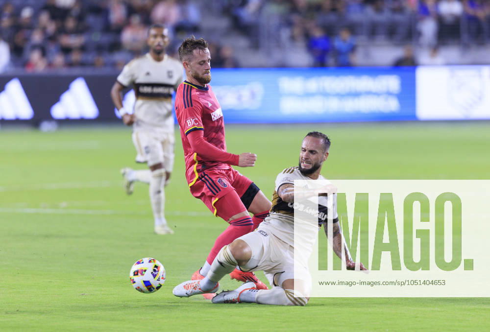 Maxime Chanot 25 of the Los Angeles Football Club slide tackles Rasmus Alm 21 of the St. Louis City SC during their regular season MLS, Fussball Herren, USA game on Wednesday October 2, 2024 at the BMO Stadium in Los Angeles, California. LAFC defeats St. Louis, 1-0. ARIANA RUIZ PI Los Angeles U.S - ZUMAp124 20241002_zaa_p124_098