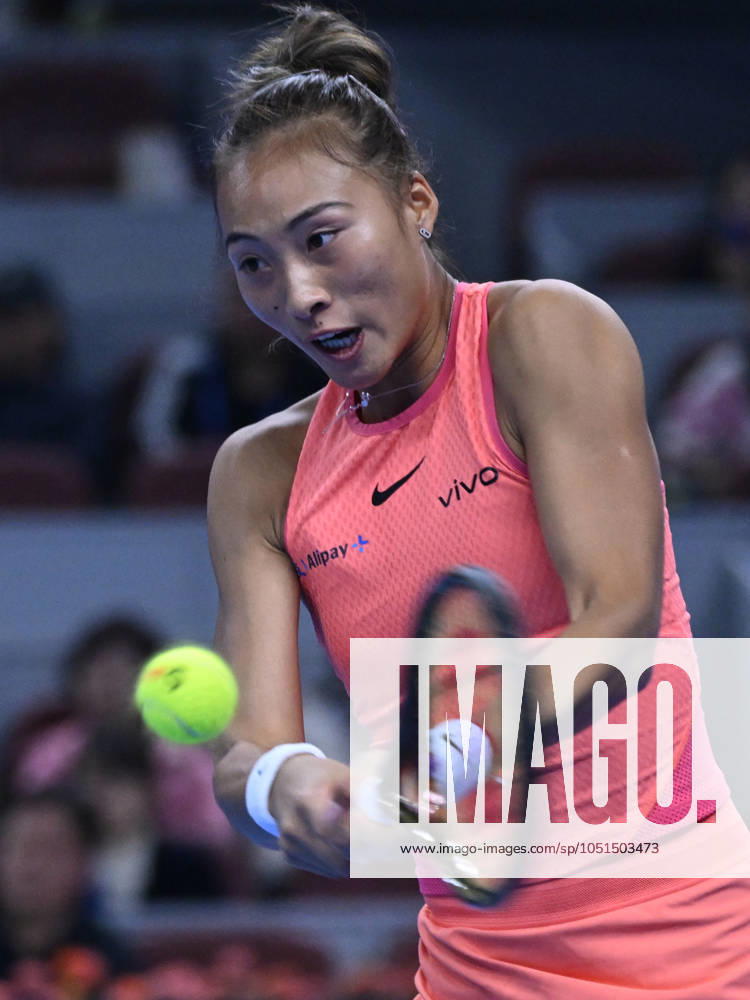 (241004) -- BEIJING, Oct. 4, 2024 -- Zheng Qinwen hits a return during the women s singles quarterfinal match between Zheng Qinwen of China and Mirra Andreeva of Russia at the 2024 China Open tennis tournament in Beijing, China, Oct. 4, 2024. ) (SP)CHINA-BEIJING-TENNIS-CHINA OPEN-WOMEN S SINGLES(CN) ZhangxLong