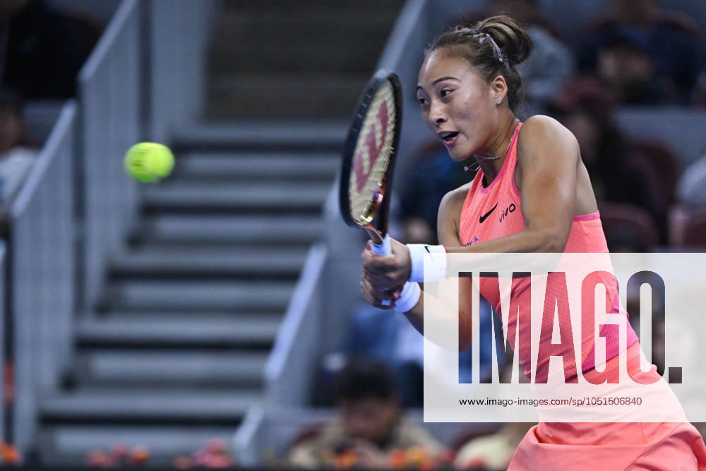 (241004) -- BEIJING, Oct. 4, 2024 -- Zheng Qinwen hits a return during the women s singles quarterfinal match between Zheng Qinwen of China and Mirra Andreeva of Russia at the 2024 China Open tennis tournament in Beijing, China, Oct. 4, 2024. ) (SP)CHINA-BEIJING-TENNIS-CHINA OPEN-WOMEN S SINGLES(CN) ZhangxLong