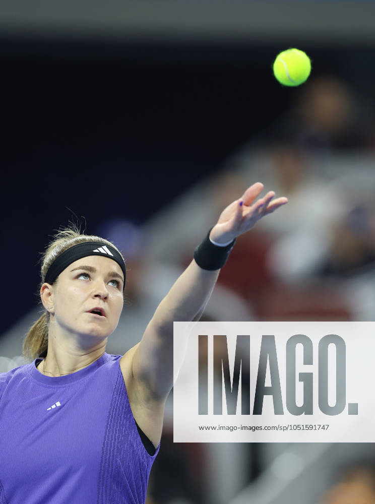 (241005) -- BEIJING, Oct. 5, 2024 -- Karolina Muchova of the Czech Republic serves during the women s singles semifinal match against Zheng Qinwen of China at 2024 China Open tennis tournament in Beijing, capital of China, Oct. 5, 2024. (Photo by Xinhua) (SP)CHINA-BEIJING-TENNIS-CHINA OPEN-WOMEN S SINGLES(CN) DuxXinyi