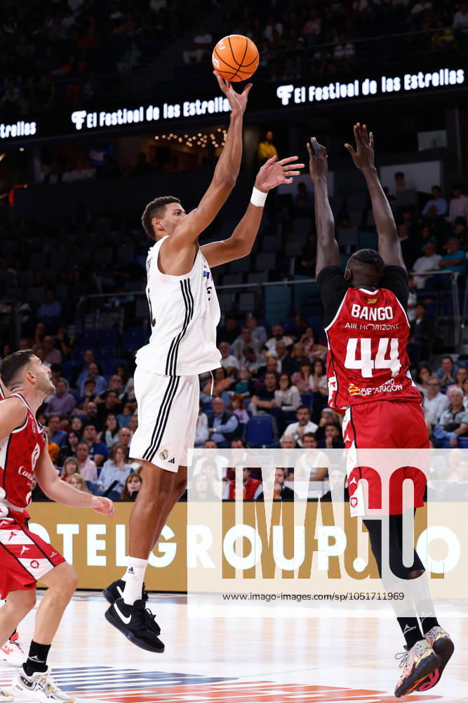 Walter Samuel Tavares da Veiga of Real Madrid and Jilson Bango of Casademont Zaragoza in action during the Spanish League, Liga ACB Endesa, basketball match played between Real Madrid and Casademont Zaragoza at WiZink Center on October 6, 2024 in Madrid, Spain. Madrid SPAIN - ZUMAa181 20241006_zaa_a181_122