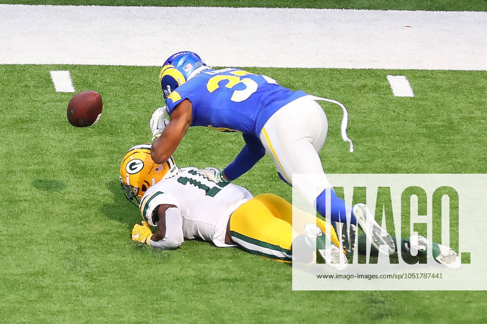 INGLEWOOD, CA - OCTOBER 6: Los Angeles Rams safety Quentin Lake (37) with tight coverage on Green Bay Packers wide receiver Jayden Reed (11) during the NFL, American Football Herren, USA game between the Green Bay Packers and the Los Angeles Rams on October 06, 2024, at SoFi Stadium in Inglewood, CA. (Photo by Jevone Moore Icon Sportswire) NFL: OCT 06 Packers at Rams Icon20241006058