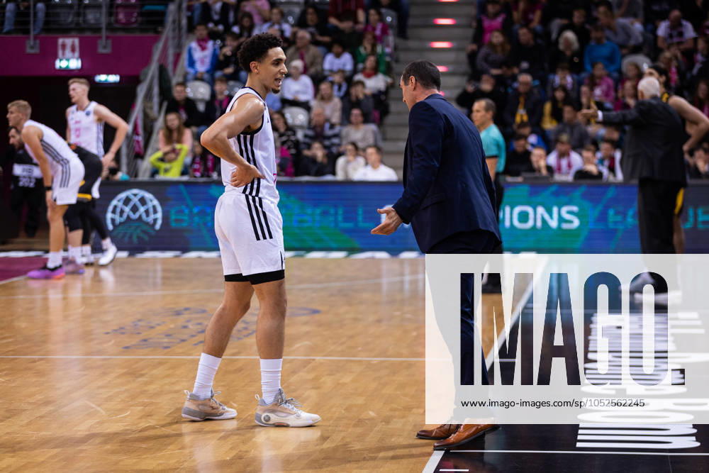 Basketball Champions League, Telekom Baskets Bonn vs AEK Betsson BC, 15 10 2024 Angelo Allegri Telekom Baskets Bonn 6 gets tips from Roel Moors Headcoach Telekom Baskets Bonn Basketball Champions League, Telekom Baskets Bonn vs AEK Betsson BC, 15 10 2024, Telekom Dome, Bonn