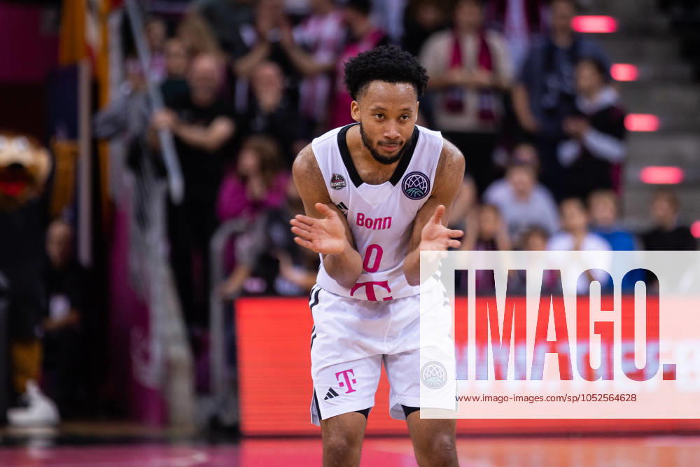 Basketball Champions League, Telekom Baskets Bonn vs AEK Betsson BC, 15 10 2024 Darius McGhee Telekom Baskets Bonn 0 applauds himself for his performance Basketball Champions League, Telekom Baskets Bonn vs AEK Betsson BC, 15 10 2024, Telekom Dome, Bonn