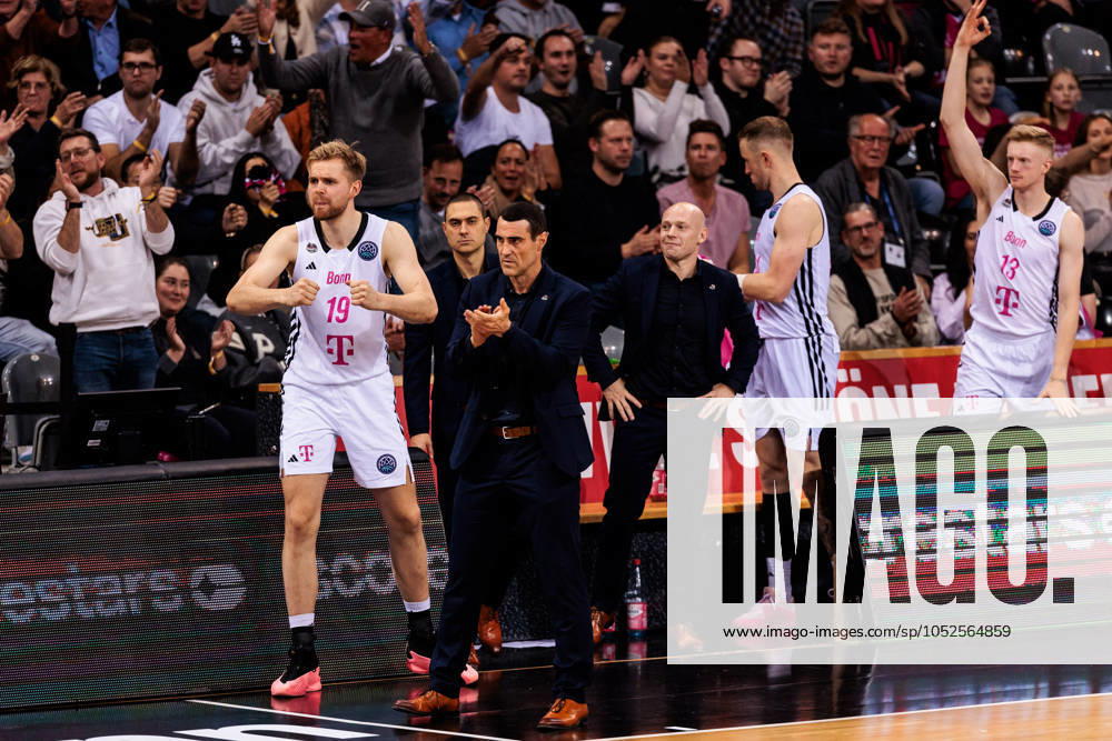 Basketball Champions League, Telekom Baskets Bonn vs AEK Betsson BC, 15 10 2024 The Telekom Baskets Bonn bench cheers Till Pape Telekom Baskets Bonn, 19 , Roel Moors Coach Telekom Baskets Bonn Basketball Champions League, Telekom Baskets Bonn vs AEK Betsson BC, Bonn, Telekom Dome on 15 10 2024