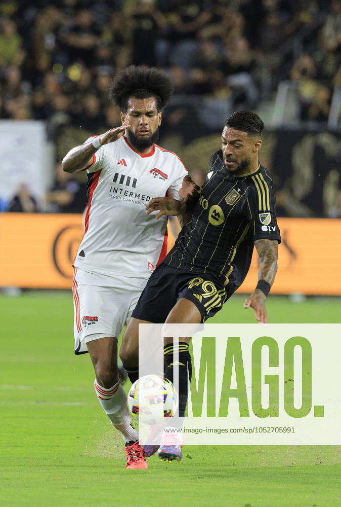 Denis Bouanga 99 of the Los Angeles Football Club is defended by Rodrigues 26 of the San Jose Earthquakes during their regular season MLS, Fussball Herren, USA match on Saturday October 19, 2024 at the BMO Stadium in Los Angeles, California. LAFC defeats Earthquakes, 3-1. JAVIER ROJAS PI Los Angeles USA - ZUMAp124 20241019_zaa_p124_045