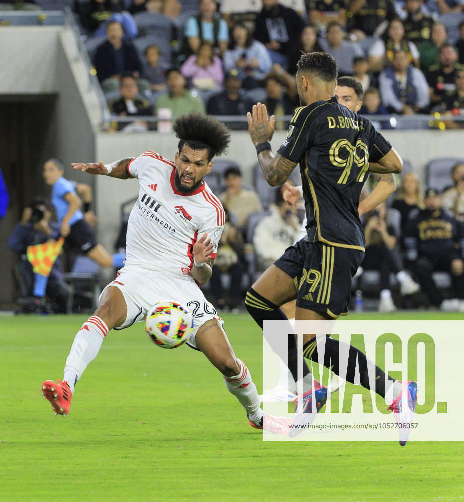 Denis Bouanga 99 of the Los Angeles Football Club is defended by Rodrigues 26 of the San Jose Earthquakes during their regular season MLS, Fussball Herren, USA match on Saturday October 19, 2024 at the BMO Stadium in Los Angeles, California. LAFC defeats Earthquakes, 3-1. JAVIER ROJAS PI Los Angeles USA - ZUMAp124 20241019_zaa_p124_051