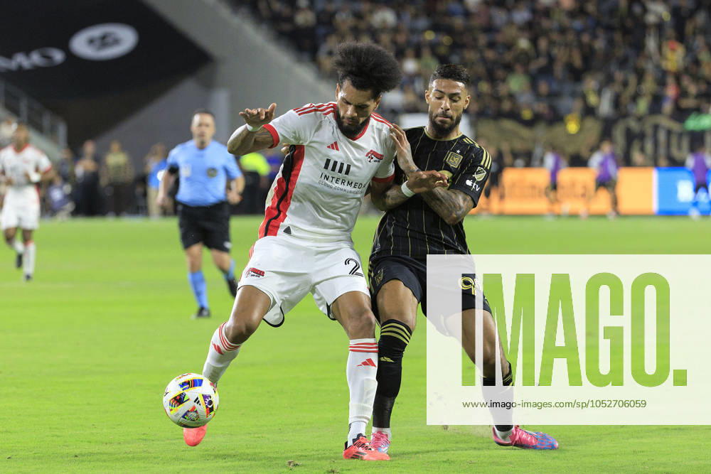 Denis Bouanga 99 of the Los Angeles Football Club is defended by Rodrigues 26 of the San Jose Earthquakes during their regular season MLS, Fussball Herren, USA match on Saturday October 19, 2024 at the BMO Stadium in Los Angeles, California. LAFC defeats Earthquakes, 3-1. JAVIER ROJAS PI Los Angeles USA - ZUMAp124 20241019_zaa_p124_054