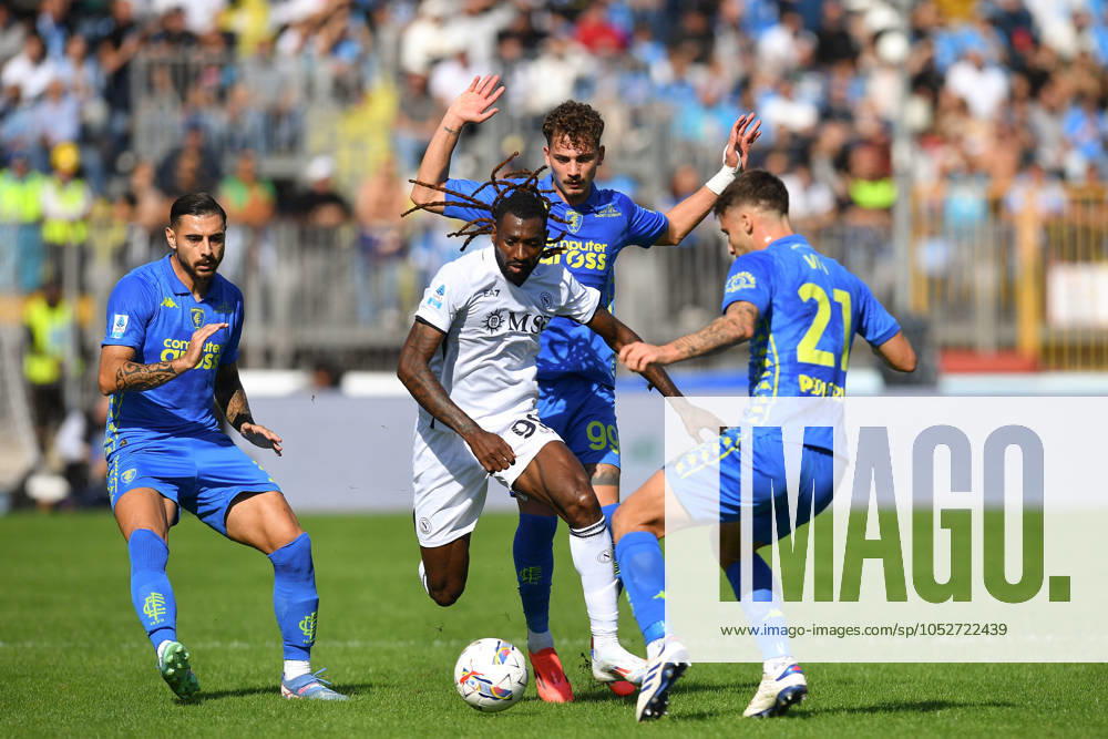 Napoli s Andre-Frank Zambo Anguissa fights for the ball with Empoli s Sebastiano Esposito and Empoli s Mattia Viti during the Serie A Enilive 2024 2025 match between Empoli and Napoli - Serie A Enilive at Carlo Catellani Stadium - Soccer - Empoli, Italy - Sunday October 20, 2024