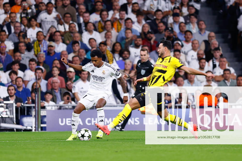 Rodrygo Goes of Real Madrid and Ramy Bensebaini of Borussia Dortmund in action during the UEFA Champions League 2024 25 League Phase MD3 match between Real Madrid CF and Borussia Dortmund at Estadio Santiago Bernabeu on October 22, 2024, in Madrid, Spain. Madrid SPAIN - ZUMAa181 20241022_zaa_a181_188