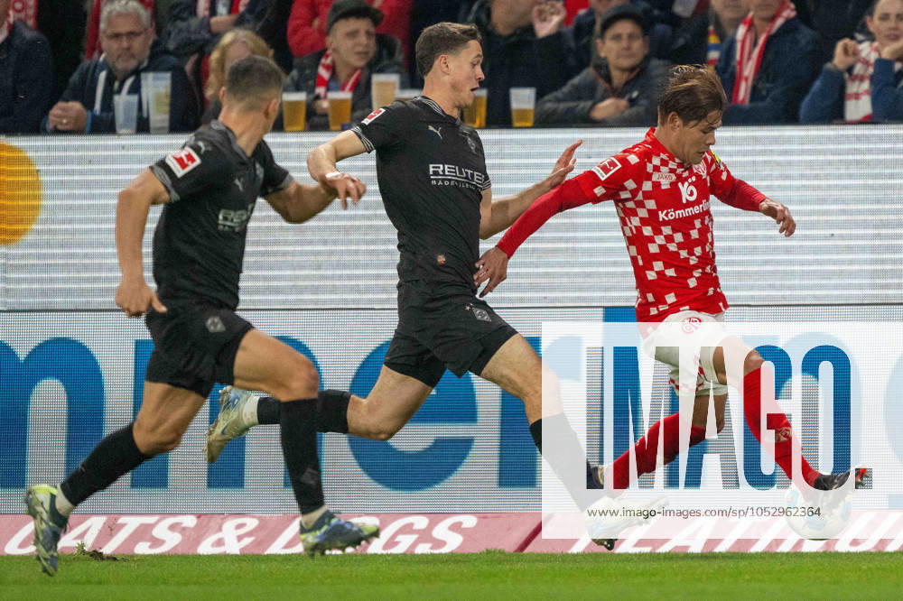 Philipp Sander Borussia Mönchengladbach Kaishu Sano Mainz 05 battle for the ball during the Bundesliga match between 1 FSV Mainz 05 and Borussia Mönchengladbach, Mewa Arena on October 25, 2024 in Mainz, Germany Photo by Wolfgang Denkinger DeFodi Images Philipp Sander Borussia Mönchengladbach Kaishu Sano Mainz 05 battle for the ball during the Bundesliga match between 1 FSV Mainz 05 and Borussia Mönchengladbach at Mewa Arena on October 25, 2024 in Mainz, Germany Photo by Wolfgang Denkinger DeFodi Images not used in POL SRB CRO FRA GBR NED ITA USA Defodi 747 747 20241025 MA05BMG 000000112 Defodi-747 not used in POL SRB CRO FRA GBR NED ITA USA DFL regulations prohibit any use of photographs as image sequences and or quasi-video.