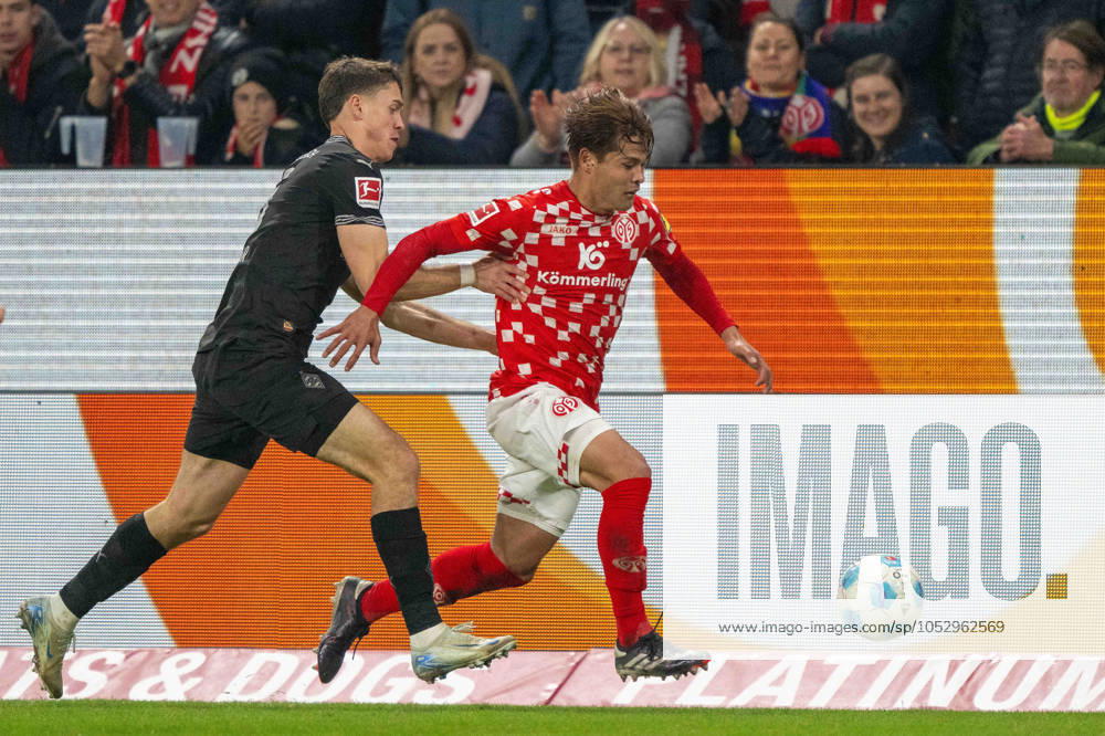 Philipp Sander Borussia Mönchengladbach Kaishu Sano Mainz 05 battle for the ball during the Bundesliga match between 1 FSV Mainz 05 and Borussia Mönchengladbach, Mewa Arena on October 25, 2024 in Mainz, Germany Photo by Wolfgang Denkinger DeFodi Images Philipp Sander Borussia Mönchengladbach Kaishu Sano Mainz 05 battle for the ball during the Bundesliga match between 1 FSV Mainz 05 and Borussia Mönchengladbach at Mewa Arena on October 25, 2024 in Mainz, Germany Photo by Wolfgang Denkinger DeFodi Images not used in POL SRB CRO FRA GBR NED ITA USA Defodi 747 747 20241025 MA05BMG 000000113 Defodi-747 not used in POL SRB CRO FRA GBR NED ITA USA DFL regulations prohibit any use of photographs as image sequences and or quasi-video.