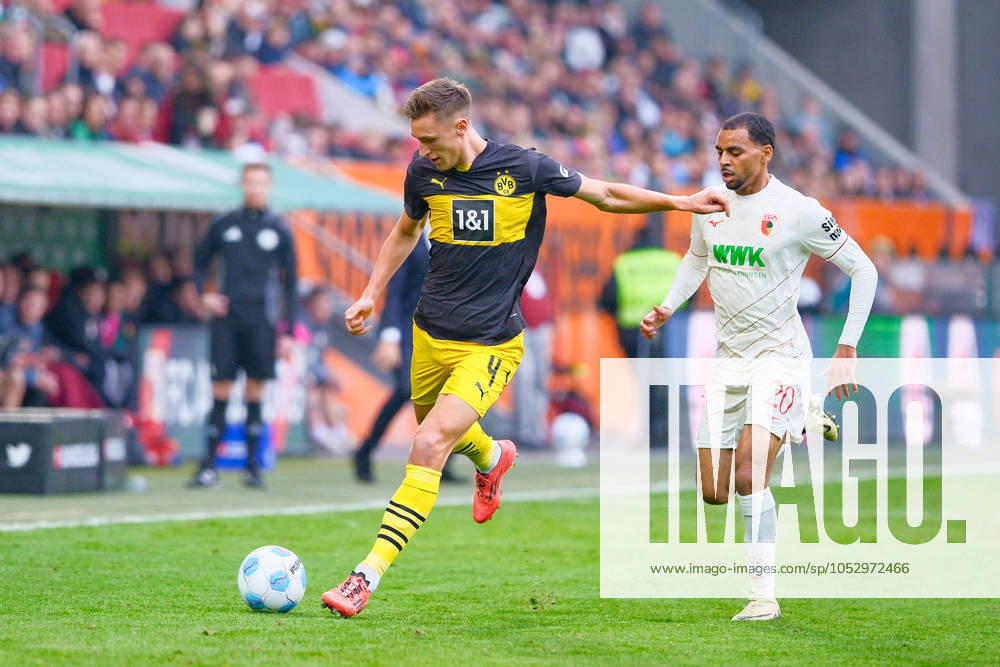 Nico Schlotterbeck 4, Borussia Dortmund and Alexis Claude Maurice 20, FC Augsburg at the match FC Augsburg v Borussia Dortmund, Soccer, Men, Bundesliga 2024 2025, Matchday 8 on 26 10 2024 in Augsburg, WWK Arena DFL and DFB regulations prohibit any use of photographs as image sequences and or quasi video Bayern Germany