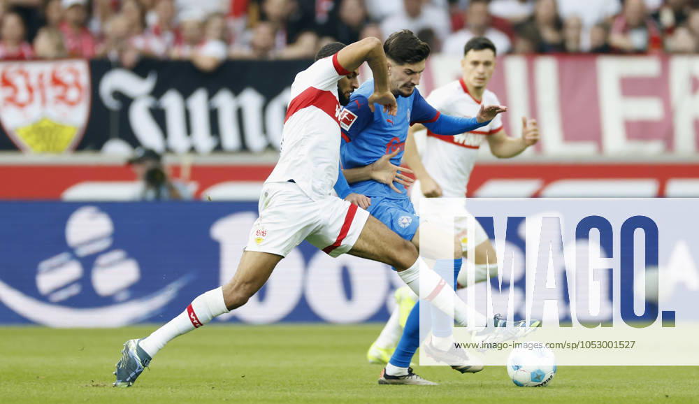 In the picture from l Josha Vagnoman VFB Stuttgart, 4 and Armin Gigovic Holstein Kiel, 37 in a duel, 26 10 2024, Soccer, Bundesliga, VfB Stuttgart Holstein Kiel, GER, Stuttgart, MHP Arena, DFL REGULATIONS PROHIBIT ANY USE OF PHOTOGRAPHS AS IMAGE SEQUENCES AND OR QUASI VIDEO