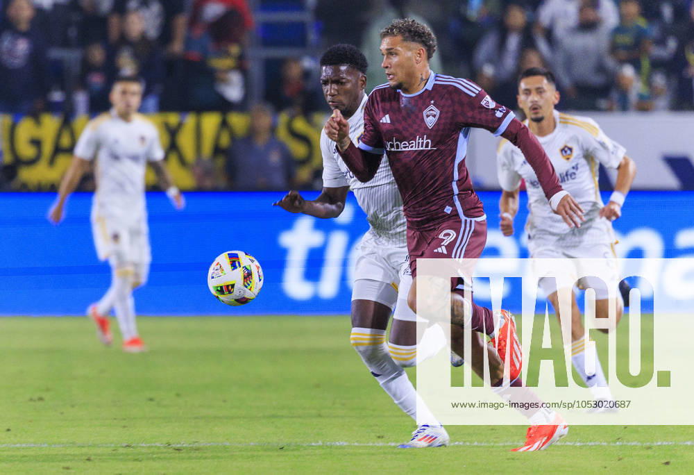Andreas Maxso 5 of the Colorado Rapids is challenged by Emiro Garces 25 of the LA Galaxy during the Audi 2024 MLS, Fussball Herren, USA Cup Playoffs Round One Game 1 of 3 on Saturday October 26, 2024 at Dignity Health Sports Park Stadium in Carson, California. The Galaxy defeats Rapids, 5-0. JAVIER ROJAS PI Los Angeles USA - ZUMAp124 20241026_zaa_p124_038