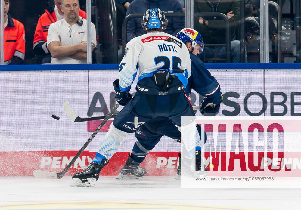 Battle for the puck duel between Leon Huettl ERC Ingolstadt Panther, 25 and Adam Brooks EHC Red Bull Muenchen, 77 GER, EHC Red Bull Muenchen vs ERC Ingolstadt Panther, Ice Hockey, DEL, Matchday 13, Season 2024 2025, 27 10 2024 GER, EHC Red Bull Muenchen vs ERC Ingolstadt Panther, Ice Hockey, DEL, Matchday 13, Season 2024 2025, 27 10 2024 Muenchen