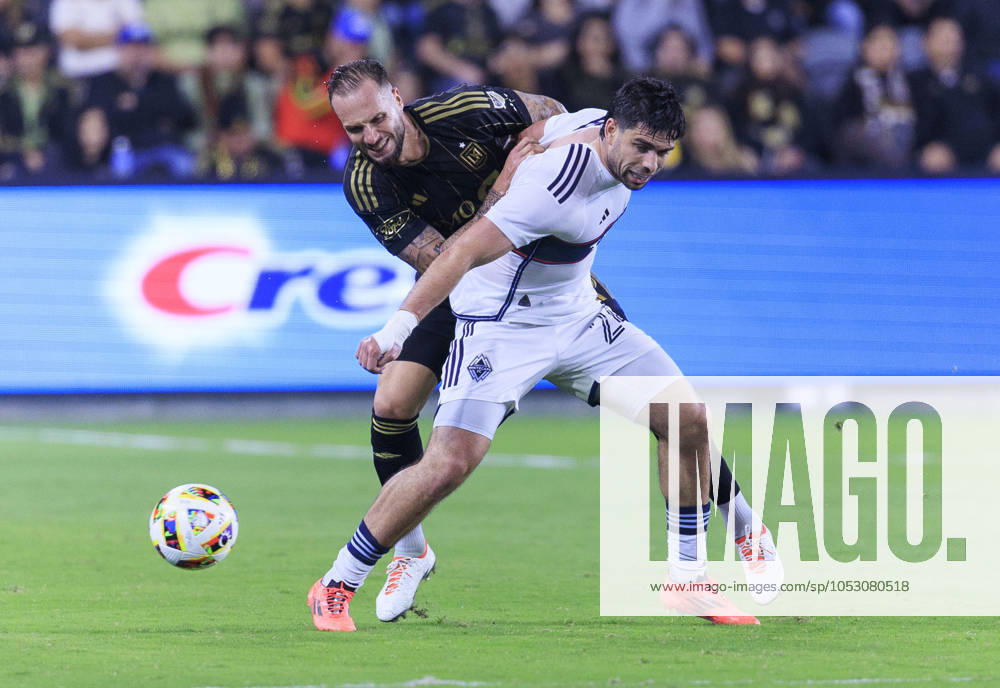 Maxime Chanot 25 of the Los Angeles Football Club defends against Brian White 24 of the Vancouver Whitecaps during the Audi 2024 MLS, Fussball Herren, USA Cup Playoffs Round One Game 1 of 3 on Sunday October 27, 2024 at BMO Stadium in Los Angeles, California. LAFC defeats Whitecaps, 2-1. ARIANA RUIZ PI Los Angeles U.S - ZUMAp124 20241027_zaa_p124_051