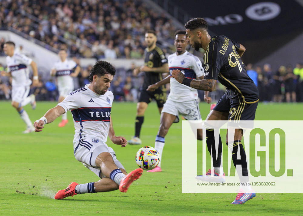 Brian White 24 of the Vancouver Whitecaps blocks a pass by Denis Bouanga 99 of the Los Angeles Football Club during the Audi 2024 MLS, Fussball Herren, USA Cup Playoffs Round One Game 1 of 3 on Sunday October 27, 2024 at BMO Stadium in Los Angeles, California. LAFC defeats Whitecaps, 2-1. JAVIER ROJAS PI Los Angeles USA - ZUMAp124 20241027_zaa_p124_061