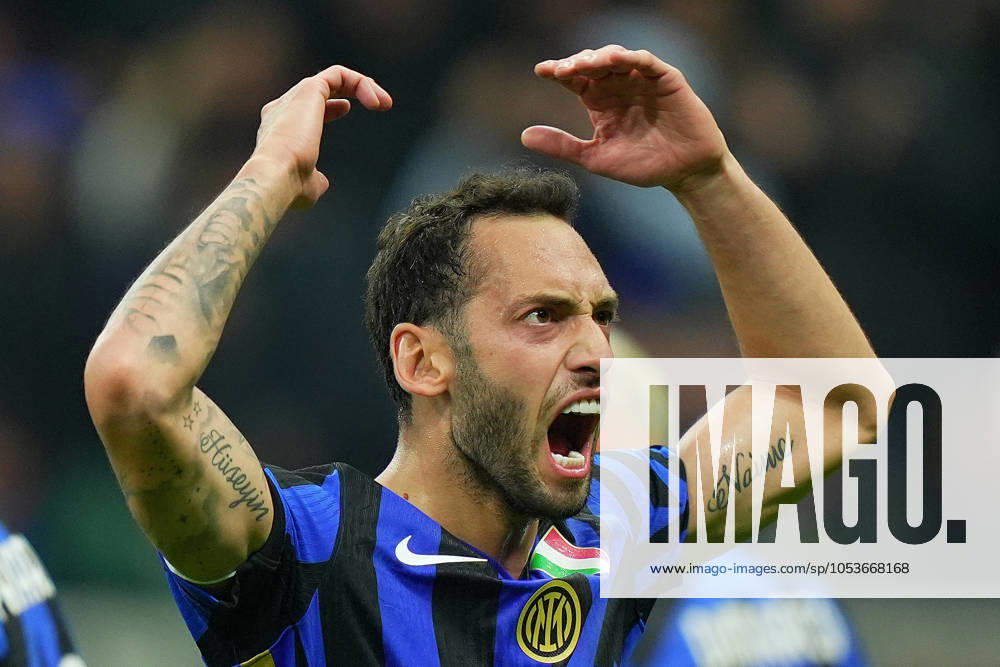 Inter Milan s Hakan Calhanoglu celebrates after scoring 1-1 during the Serie A soccer match between Inter and Napoli at San Siro Stadium in Milan , North Italy - Sunday , november 10 , 2024. - Soccer .