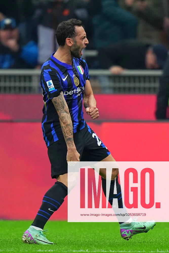Inter Milan s Hakan Calhanoglu celebrates after scoring 1-1 during the Serie A soccer match between Inter and Napoli at San Siro Stadium in Milan , North Italy - Sunday , november 10 , 2024. - Soccer .