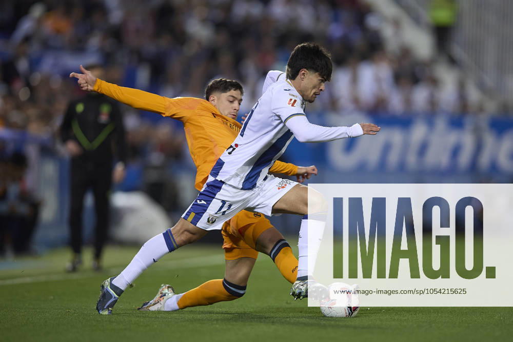 Jude Bellingham Real Madrid CF and Juan Cruz CD Leganes battle for the ball during the LaLiga match between CD LeganÃ s and Real Madrid at Butarque on November 24, 2024 in LeganÃ s, Spain Photo by Manu Reino DeFodi Images Defodi 071 LEGRMC20241124 039 Defodi-071