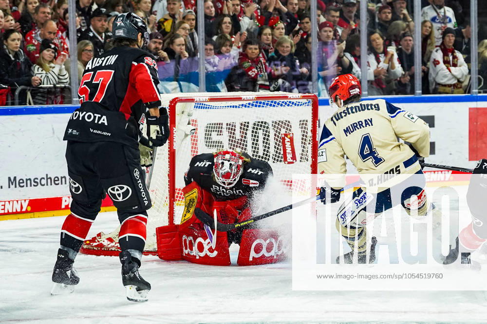 Ice Hockey Penny DEL 22 Matchday Cologne Sharks Schwenninger Wild Wings on 01 12 2024 at the Lanxess Arena in Cologne Brady Austin Cologne , left Mirko Pantkowski Cologne , center Jordan Murray Schwenningen , right According to the regulations of the DEL German Ice Hockey League, the publication and further use of the recordings in electronic media and end devices of all kinds during the ongoing game is not permitted