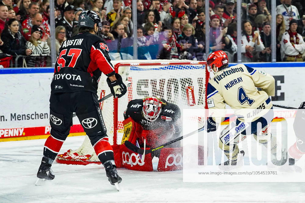 Ice Hockey Penny DEL 22 Matchday Cologne Sharks Schwenninger Wild Wings on 01 12 2024 at the Lanxess Arena in Cologne Brady Austin Cologne , left Mirko Pantkowski Cologne , center Jordan Murray Schwenningen , right According to the regulations of the DEL German Ice Hockey League, the publication and further use of the recordings in electronic media and end devices of all kinds during the ongoing game is not permitted