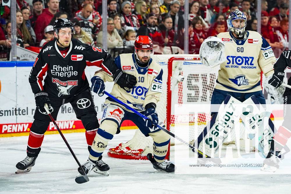 Ice Hockey Penny DEL 22 Matchday Cologne Sharks Schwenninger Wild Wings on 01 12 2024 at the Lanxess Arena in Cologne Juhani Tyrväinen Cologne , left Mirko Höfflin Schwenningen , center Joacim Eriksson Schwenningen , right According to the regulations of the DEL German Ice Hockey League, the publication and further use of the recordings in electronic media and end devices of all kinds during the ongoing game is not permitted