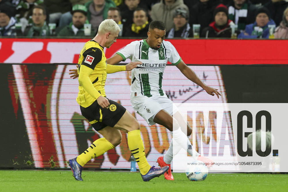 Julian Ryerson Borussia Dortmund and Alassane Plea Borussia Moenchengladbach battle for the ball, Bundesliga, Borussia Mönchengladbach v Borussia Dortmund, Stadium in Borussia Park, December 07, 2024 in Mönchengladbach, Germany Photo by Marco Steinbrenner DeFodi Images Julian Ryerson Borussia Dortmund and Alassane Plea Borussia Moenchengladbach battle for the ball, Bundesliga, Borussia Mönchengladbach v Borussia Dortmund, Stadium in Borussia Park, December 7, 2024 in Mönchengladbach, Germany Photo by Marco Steinbrenner DeFodi Images DFL regulations prohibit any use of photographs as image sequences and or quasi video Defodi 700 mg bvb 20241207 032 Defodi-700 DFL regulations prohibit any use of photographs as image sequences and or quasi-video.