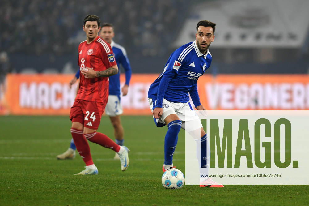 Kenan Karaman FC Schalke 04 in action, on the ball, single action during the 2 Bundesliga match between FC Schalke 04 and Fortuna Düsseldorf at Veltins Arena on December 14, 2024 in Gelsenkirchen, Germany Germany Photo by Ralf Treese DeFodi Images Kenan Karaman FC Schalke 04 controls the ball during the 2 Bundesliga match between FC Schalke 04 and Fortuna Düsseldorf at Veltins Arena on December 14, 2024 in Gelsenkirchen, Germany Photo by Ralf Treese DeFodi Images DFB DFL REGULATIONS PROHIBIT ANY USE OF PHOTOGRAPHS AS IMAGE SEQUENCES AND OR QUASI VIDEO Defodi 521 S04F9520241214 016 Defodi-521 DFB DFL REGULATIONS PROHIBIT ANY USE OF PHOTOGRAPHS AS IMAGE SEQUENCES AND OR QUASI-VIDEO.