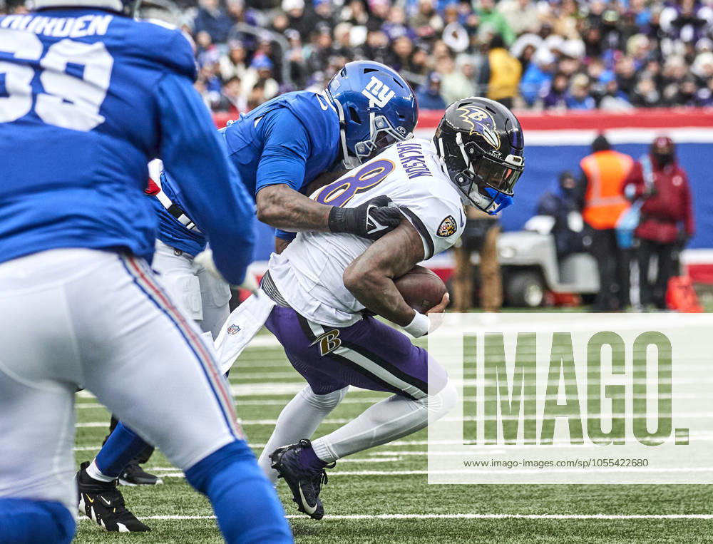 Baltimore Ravens quarterback Lamar Jackson (8) is sacked by New York Giants linebacker Brian Burns (0) during a NFL, American Football Herren, USA game at MetLife Stadium in East Rutherford, New Jersey. CSM East Rutherford United States - ZUMAc04_ 20241215_zma_c04_129