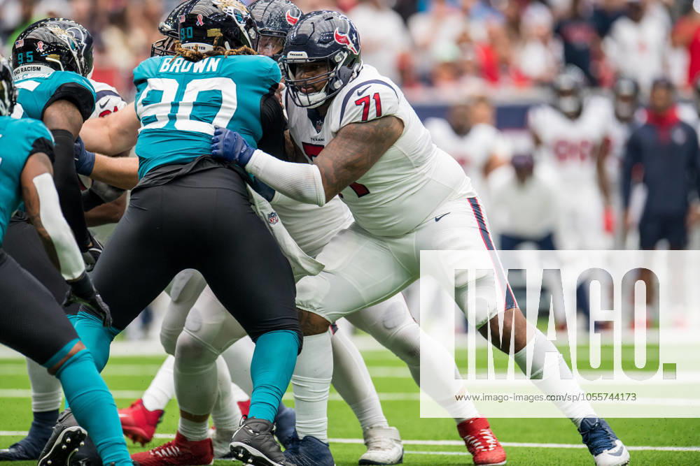 NFL, American Football Herren, USA 2021: Jaguars vs Texans SEP 12 September 12, 2021: Houston Texans offensive tackle Tytus Howard (71) blocks Jacksonville Jaguars defensive tackle Malcom Brown (90) during the 2nd quarter of an NFL football game between the Jacksonville Jaguars and the Houston Texans at NRG Stadium in Houston, TX. The Texans won the game 37 to 21...Trask Smith CSM Houston TX U.S.