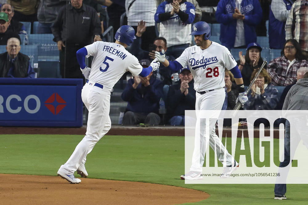 Los Angeles Dodgers first baseman Freddie Freeman (5) celebrates a home run with designated hitter J.D. Martinez (28) during a MLB, Baseball Herren, USA regular season game between the Los Angeles Dodgers and New York Mets, Monday, April 18, 2023 in Los Angeles, CA. The Mets defeated the Dodgers 8-6. (Brandon Sloter Image of Los Angeles CA United States