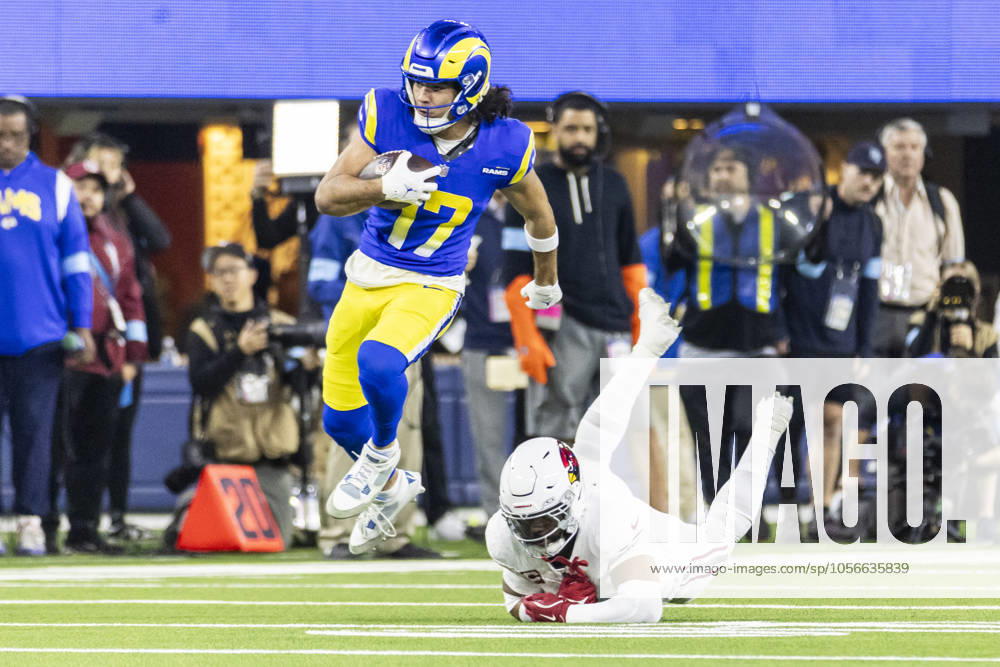 NFL, American Football Herren, USA 2024: Los Angeles Rams Vs Arizona Cardinals in Los Angeles - 28 Dec 2024 Los Angeles Rams wide receiver Puka Nacua 17 escapes a tackle from the Arizona Cardinals during an NFL football game at SoFi Stadium. Los Angeles United States
