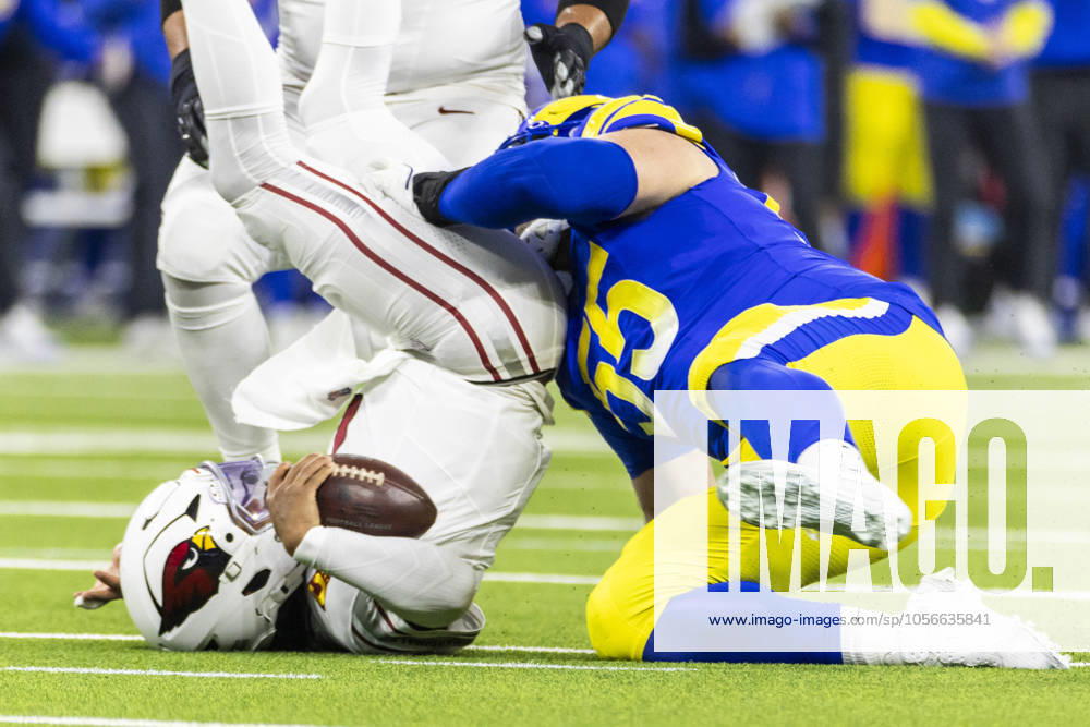 NFL, American Football Herren, USA 2024: Los Angeles Rams Vs Arizona Cardinals in Los Angeles - 28 Dec 2024 Arizona Cardinals quarterback Kyler Murray (L) is brought down by Los Angeles Rams defensive end Braden Fiske 55 during an NFL football game at SoFi Stadium. Los Angeles United States
