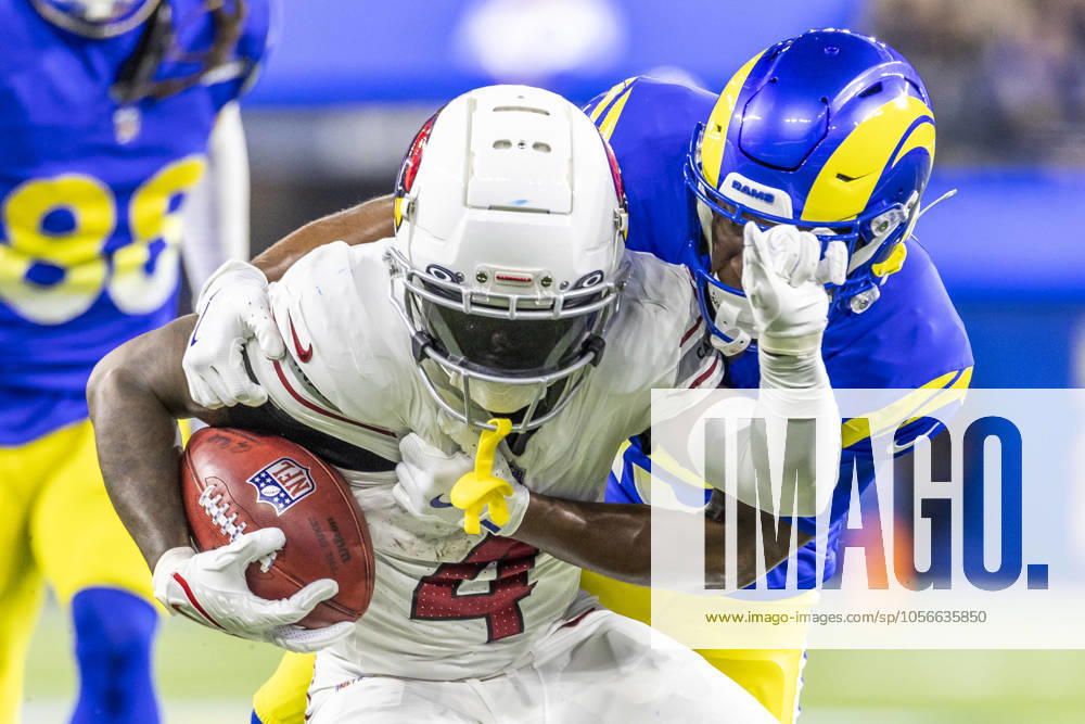 NFL, American Football Herren, USA 2024: Los Angeles Rams Vs Arizona Cardinals in Los Angeles - 28 Dec 2024 Arizona Cardinals wide receiver Greg Dortch 4 is stopped by Los Angeles Rams wide receiver Xavier Smith 19 during an NFL football game at SoFi Stadium. Los Angeles United States