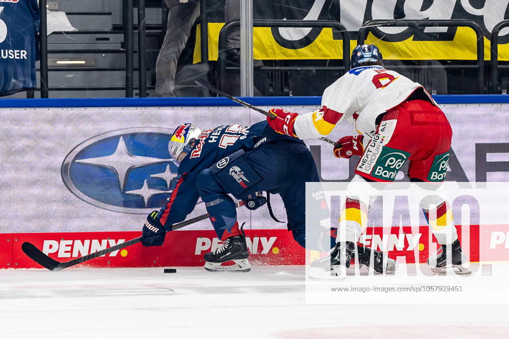 Battle for the puck duel between Nikolaus Heigl EHC Red Bull Muenchen, 15 and Tyler Angle Duesseldorfer EG, 94 GER, EHC Red Bull Muenchen vs Duesseldorfer EG, Ice Hockey, DEL, Matchday 38, Season 2024 2025, 19 01 2025 GER, EHC Red Bull Muenchen vs Duesseldorfer EG, Ice Hockey, DEL, Matchday 38, Season 2024 2025, 19 01 2025 Muenchen