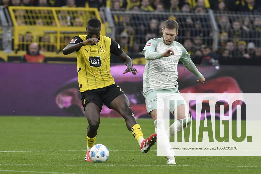 V li in duel Serhou Guirassy Dortmund 9 Mitchell Weiser Werder Bremen 8 25 01 2025 Soccer Borussia Dortmund vs SV Werder Bremen , Signal Iduna Park, Dortmund, DFB DFL REGULATIONS PROHIBIT ANY USE OF PHOTOGRAPHS AS IMAGE SEQUENCES AND OR QUASI VIDEO