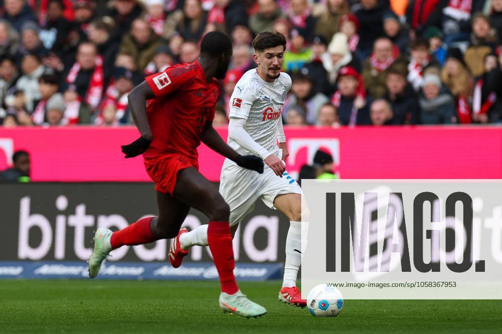 In duel, action, with Dayot Upamecano 2 FC Bayern Muenchen , Armin Gigovic 37 Holstein Kiel , FC Bayern Muenchen vs Holstein Kiel, Soccer, 1 Bundesliga, 20 Matchday, 01 02 2025 DFB regulations prohibit any use of photographs as image sequences and or quasi video Muenchen Bayern Germany