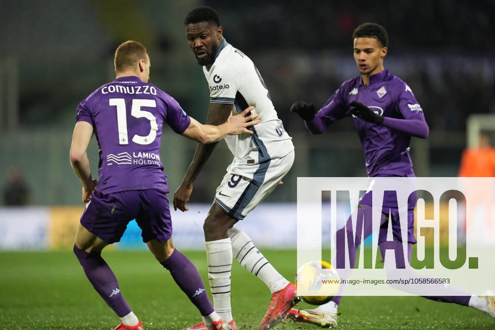Inter Milan s Marcus Thuram fights for the ball with FiorentinaÕs Pietro Commuzzo and FiorentinaÕs Amir Richardson during the Serie A Enilive 2024 2025 match between Fiorentina and Inter - Serie A Enilive at Artemio Franchi Stadium - Soccer - Florence, Italy - Thursday February 6, 2025