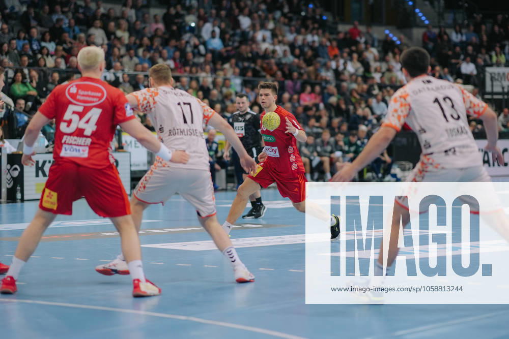 Renars Uscins TSV Hannover Burgdorf, 10 in the middle during the build-up, from l Justus Fischer TSV Hannover Burgdorf, 54 Samuel Roethlisberger TVB Stuttgart, 17 and Achilleas Toskas TVB Stuttgart, 13 , TVB Stuttgart vs TSV Hannover Burgdorf, Handball, 1 Bundesliga, Matchday 19, Season 2024 2025, 13 02 2025, TVB Stuttgart vs TSV Hannover Burgdorf, Handball, 1 Bundesliga, Matchday 19, Season 2024 2025, 13 02 2025 Stuttgart