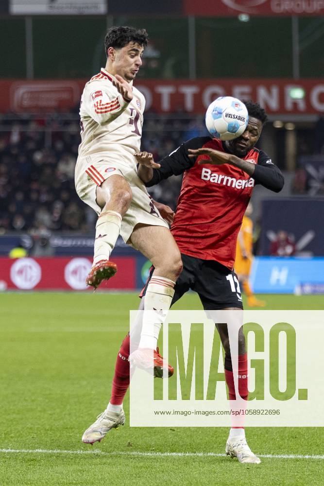 Aleksandar Pavlovic FC Bayern Munich, 45 , Edmond Tapsoba Bayer 04 Leverkusen, 12 Leverkusen, Soccer 1 Bundesliga 22 Matchday, Matchday 22, Bayer 04 Leverkusen FC Bayern Munich, 15 02 2024, BayArena, Leverkusen DFL regulations prohibit any use of photographs as image sequences and or quasi video Â