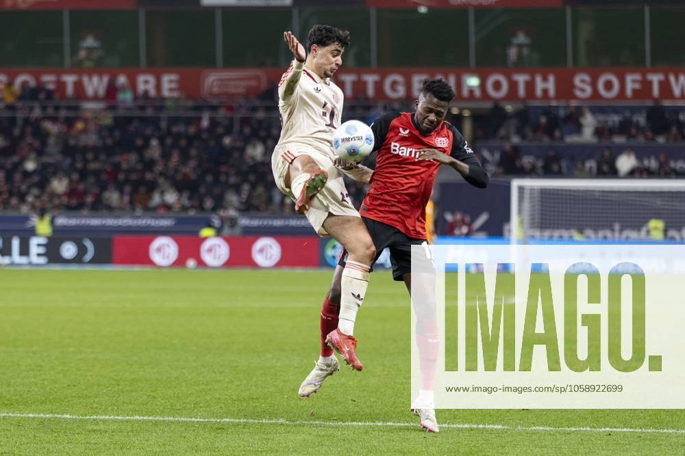 Aleksandar Pavlovic FC Bayern Munich, 45 , Edmond Tapsoba Bayer 04 Leverkusen, 12 Leverkusen, Soccer 1 Bundesliga 22 Matchday, Matchday 22, Bayer 04 Leverkusen FC Bayern Munich, 15 02 2024, BayArena, Leverkusen DFL regulations prohibit any use of photographs as image sequences and or quasi video Â