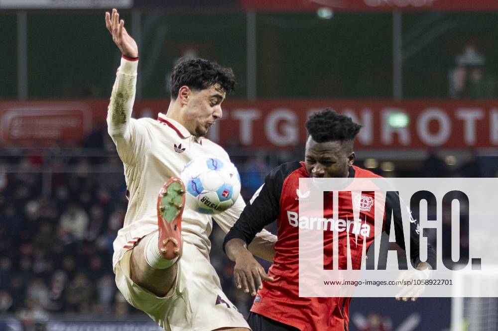 Aleksandar Pavlovic FC Bayern Munich, 45 , Edmond Tapsoba Bayer 04 Leverkusen, 12 Leverkusen, Soccer 1 Bundesliga 22 Matchday, Matchday 22, Bayer 04 Leverkusen FC Bayern Munich, 15 02 2024, BayArena, Leverkusen DFL regulations prohibit any use of photographs as image sequences and or quasi video Â