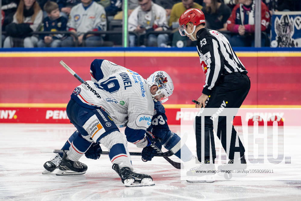 Linesperson David Tschirner executes a faceoff between Maximilian Kastner EHC Red Bull Muenchen, 93 and Eric Cornel Iserlohn Roosters, 18 GER, EHC Red Bull Muenchen vs Iserlohn Roosters, Ice Hockey, DEL, Matchday 47, Season 2024 2025, 21 02 2025 GER, EHC Red Bull Muenchen vs Iserlohn Roosters, Ice Hockey, DEL, Matchday 47, Season 2024 2025, 21 02 2025 Muenchen