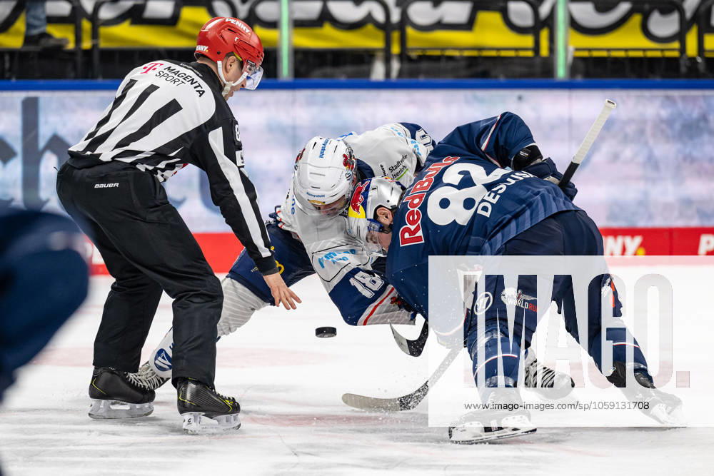 Linesperson David Tschirner executes a faceoff between Eric Cornel Iserlohn Roosters, 18 and Chris DeSousa EHC Red Bull Muenchen, 82 GER, EHC Red Bull Muenchen vs Iserlohn Roosters, Ice Hockey, DEL, Matchday 47, Season 2024 2025, 21 02 2025 GER, EHC Red Bull Muenchen vs Iserlohn Roosters, Ice Hockey, DEL, Matchday 47, Season 2024 2025, 21 02 2025 Muenchen